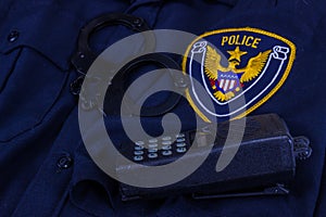 Police Uniform With Generic Police Patch, Handcuffs And Walkie Talkie