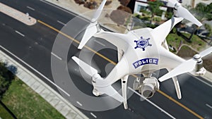 Police Unmanned Aircraft System, UAS Drone Flying Above A City Street