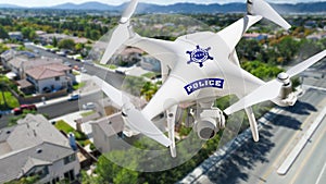 Police Unmanned Aircraft System, UAS Drone Flying Above A Neighborhood and Street