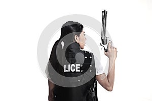 Police woman hold revolver gun