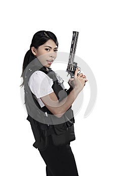 Police woman hold revolver gun