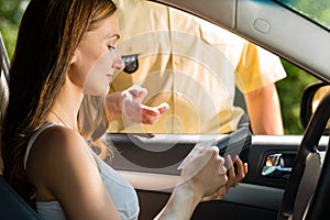 Police - woman in traffic violation getting ticket