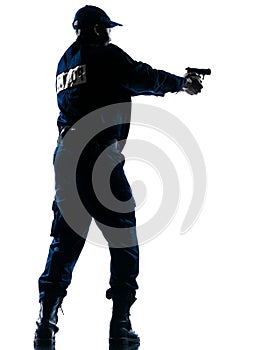 Policeman aiming handgun