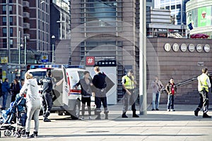 Policeman searches a teenager