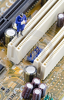 Policeman standing on the motherboard