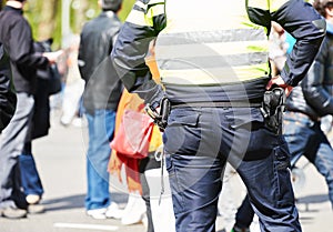 Policeman watching order in the street