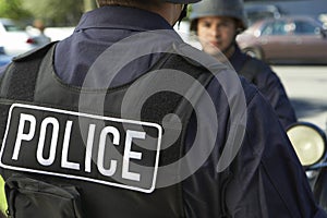 Policeman Wearing Protective Vest Outdoors