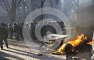 Policemen Berkut unit attacking protesters on Institutskaya street. Revolution of Dignity, the first street clashes