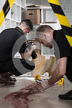 Policemen at the murder scene