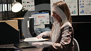 Policewoman exiting the evidence room