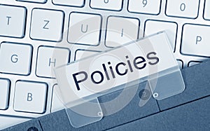 Policies folder on computer keyboard photo
