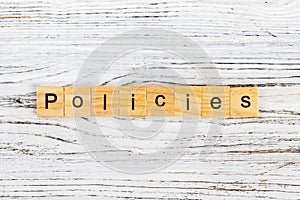 POLICIES word made with wooden blocks concept