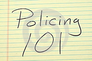 Policing 101 On A Yellow Legal Pad photo