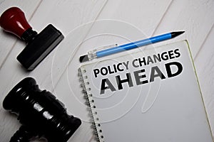 Policy Change Ahead write on a book isolated on Office Desk