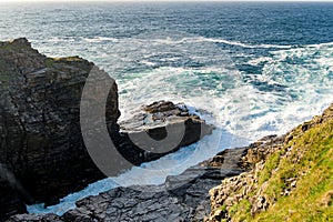 Polifreann or Hells Hole at Malin Head, Ireland\'s northernmost point, Wild Atlantic Way, spectacular coastal route. Numerous