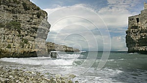 Polignano a mare beach slow motion time lapse dolly