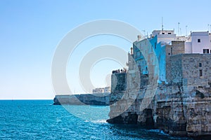 Polignano a Mare beachfront at old town. Beautiful coastal town in Apulia is being attracted to many tourists which are seen on