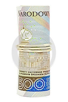 Polish banknotes of 500 PLN rolled with rubber