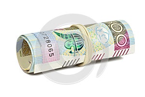 Polish banknotes of 500 PLN rolled with rubber