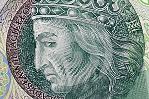 Polish currency money bill one hundred zloty. Macro crop portrait of King of Poland Wladyslaw II Jagiello. Business background.