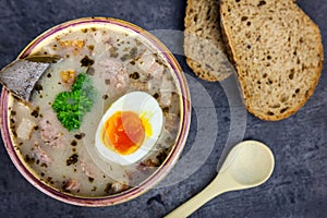 Polish easter soup with eggs and white sausage