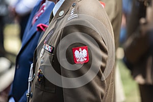 Polish emblem on the formal military uniform of a Polish soldier