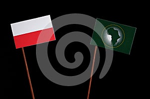 Polish flag with African Union flag on black