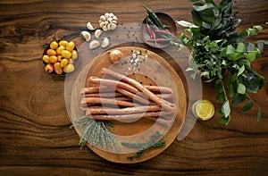 Polish kabanos sausages on rustic wood table with natural ingredients