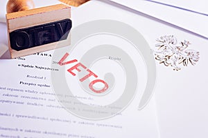 Polish law act with red veto stamp. photo