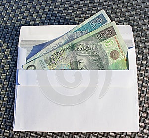 Polish money in envelope Ã¢â¬â bribe.