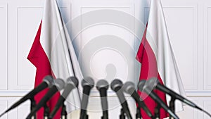 Polish official press conference. Flags of Poland and microphones. Conceptual animation
