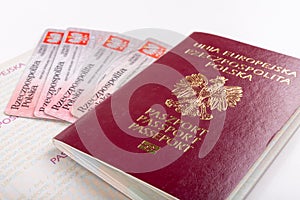 Polish passport and ID card on a white table. Personal documents from a European country