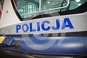 Polish police. Patrol boat. Close-up on the inscription