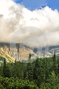 Polish Tatra mountains summer landscape with blue sky and white clouds.