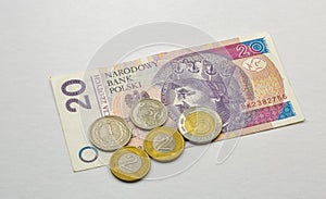 Polish twenty zloty fifty banknote and coins closeup