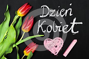 Polish Womens Day card and a bouquet of beautiful tulips on blackboard background,