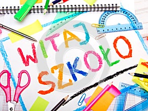 Polish words `Welcome back to school` and school accessories