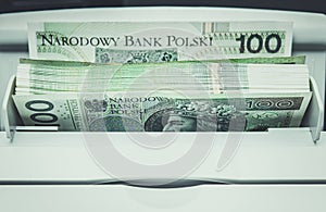 Polish Zloty Banknotes Inside Bills Counting Machine