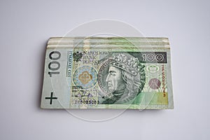 Polish zloty currency, poland money on the white background, one hundred and two hundred polish cash