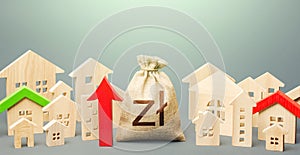Polish zloty money bag and a city of house figures and red up arrow. Recovery and growth in property prices, high demand. Rent