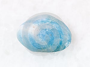 polished aquamarine gem stone on white