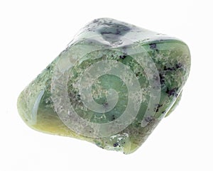 polished green garnet Grossular gem stone on white