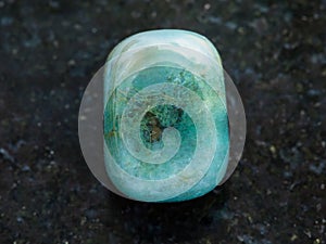 polished heliotrope gem stone on dark