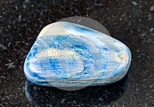 Polished Kyanite rock on black