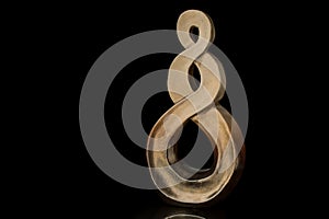 polished, painted gold loop abstract sculpture in black