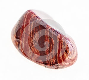 polished red brecciated jasper gemstone on white