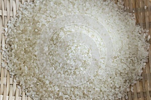 Polished rice in a bamboo basket