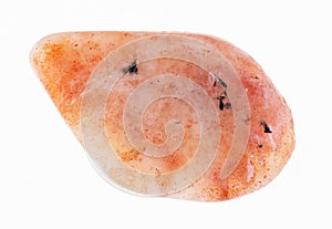 polished sunstone (heliolite) gem stone on white