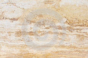 Polished surface of beautiful sand-colored Travertine. Background image, texture