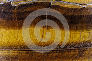 The polished surface of a Tiger eye gemstone